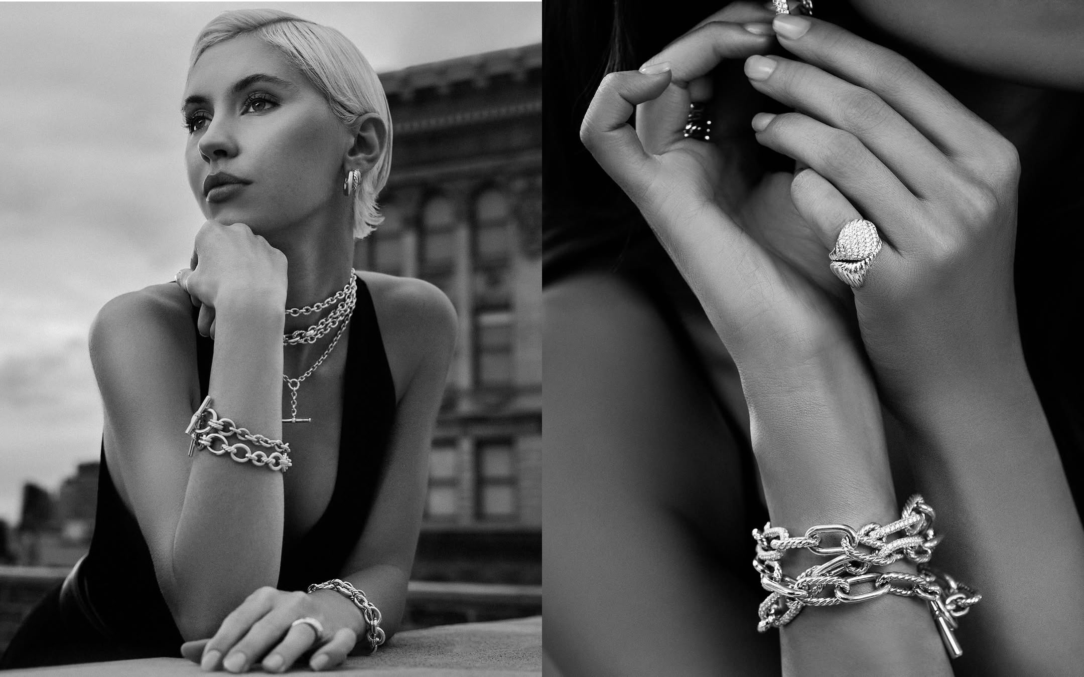 Black-and-white portrait of a woman wearing layered necklaces, earrings, and bracelets.